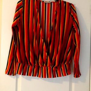 Wrap over multi coloured top. Never worn